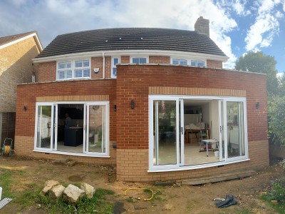 Ground floor home extension - kitchen and conservatory.